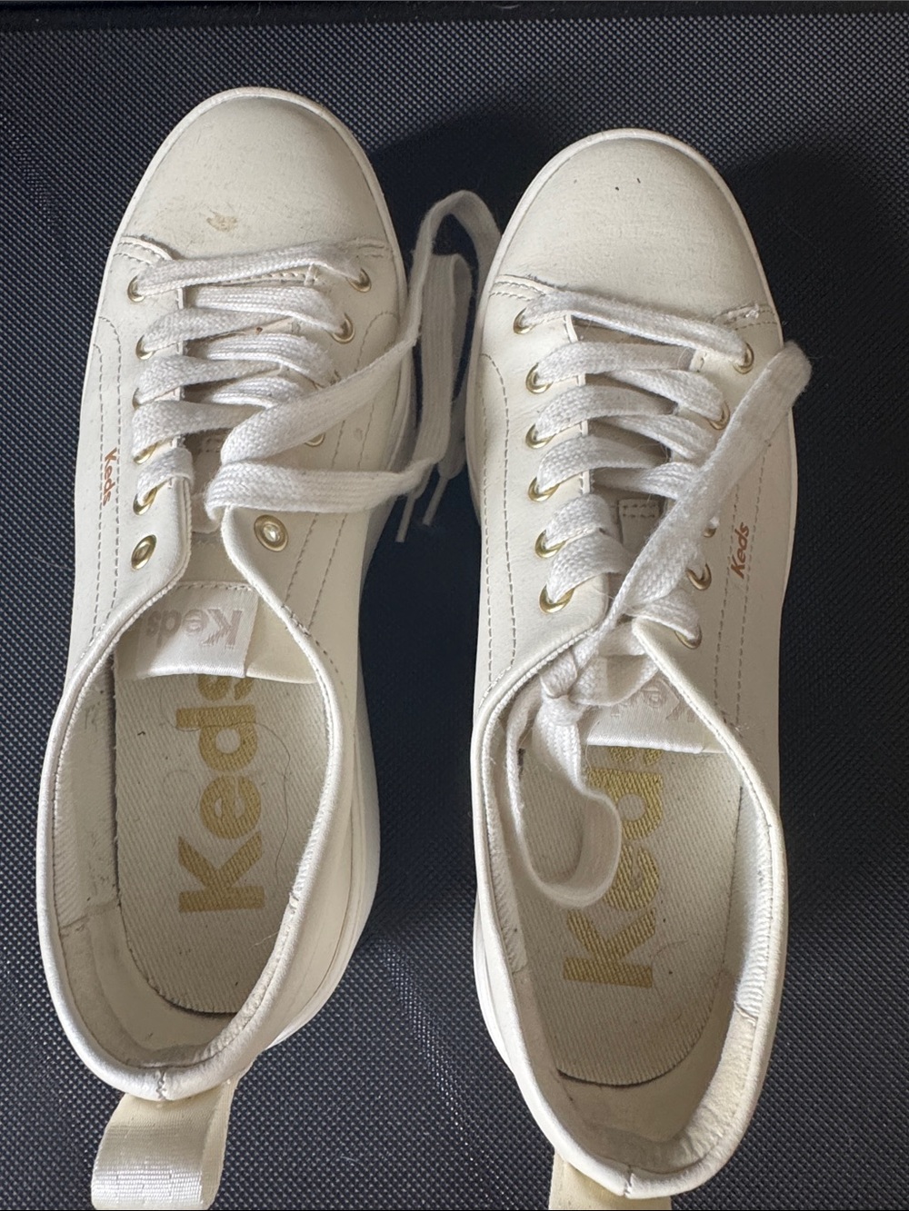 Keds Women’s White Canvas Lace-Up Sneakers with Gold Eyelets